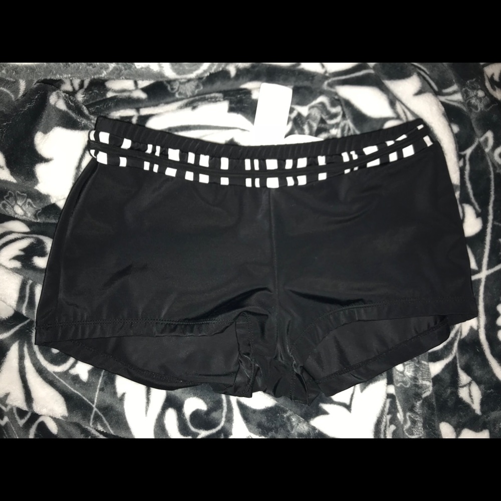 Black booty swim shorts